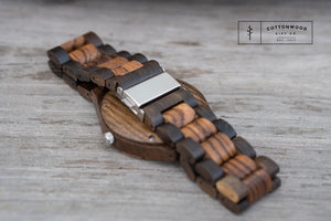 brown and black wooden watch