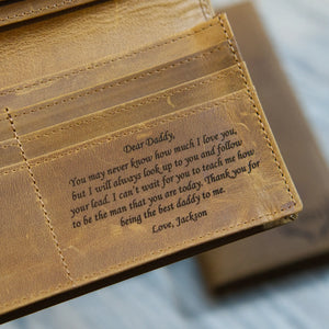 Interior right pocket of a light brown crazy horse full grain leather long wallet with personalized engraving