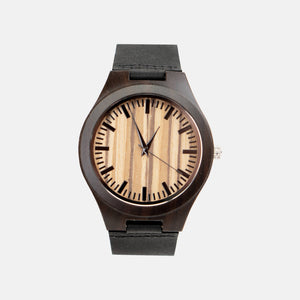 A dark brown wooden watch with striped face and a black strap shown on a white background