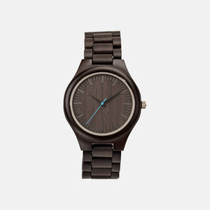 A brown wooden watch with a blue second hand and a black matching adjustable wood band