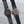 Two wooden-finished wristwatches with black leather straps, one with a personalized father's day inscription on the back.